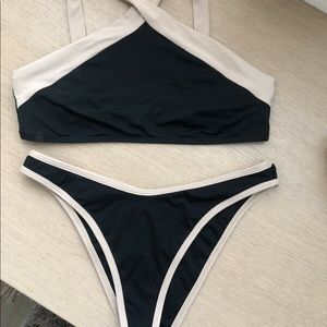 l SPACE BITSY CUT 2 piece bathing suit black &tan.